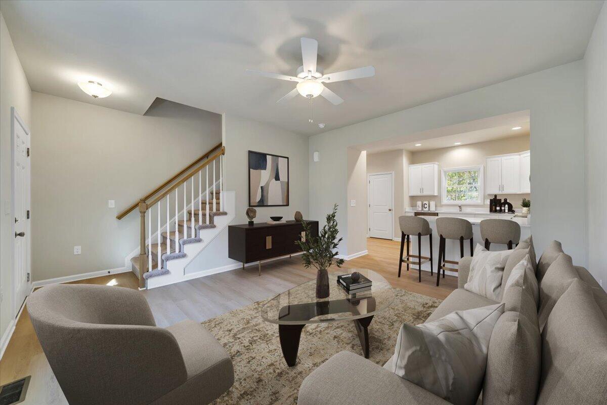 1109 Niagara Road Vinton, VA 24179 - Photo 4 of 25 a living room with furniture kitchen view and a chandelier