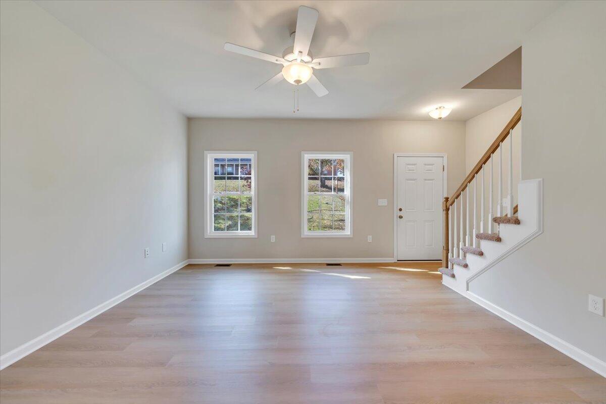 1109 Niagara Road Vinton, VA 24179 - Photo 5 of 25 a view of an empty room with wooden floor and a window