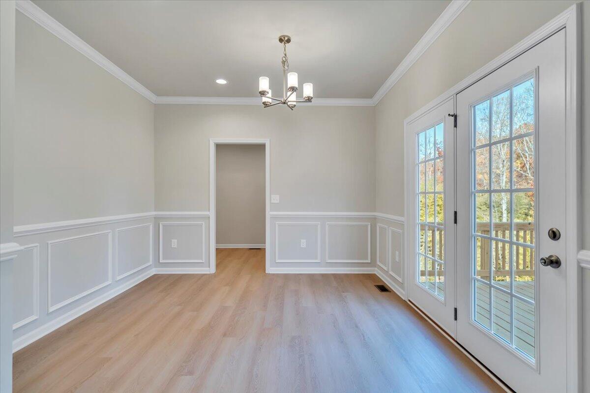 1109 Niagara Road Vinton, VA 24179 - Photo 10 of 25 wooden floor in an empty room with a window