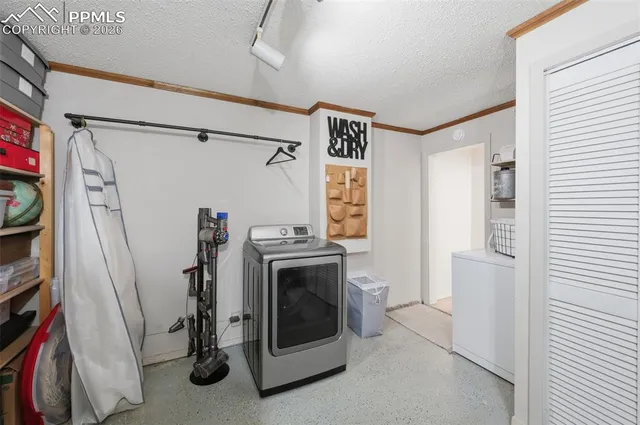 a view of a storage & utility room with closet