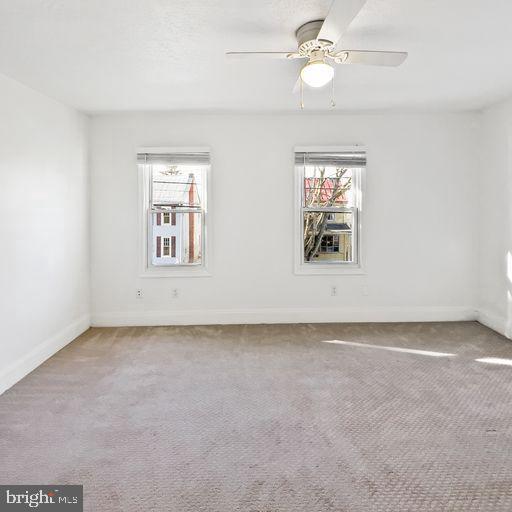 22 East 2nd Street Moorestown, NJ 08057 - Photo 14 of 23 an empty room with windows and fan
