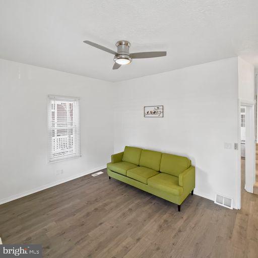 22 East 2nd Street Moorestown, NJ 08057 - Photo 4 of 23 a living room with couch and a window