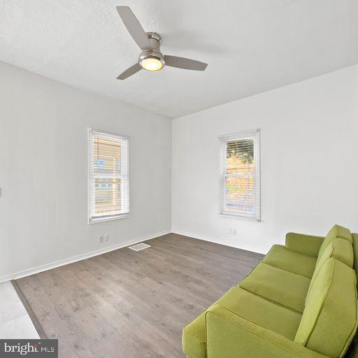 22 East 2nd Street Moorestown, NJ 08057 - Photo 5 of 23 a living room with furniture and a window