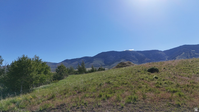 1398 Mogul Lane, Unit 1 Inkom, ID 83245 - Photo 7 of 33 Expansive property featuring varied terrain with a verdant foreground and distant mountains