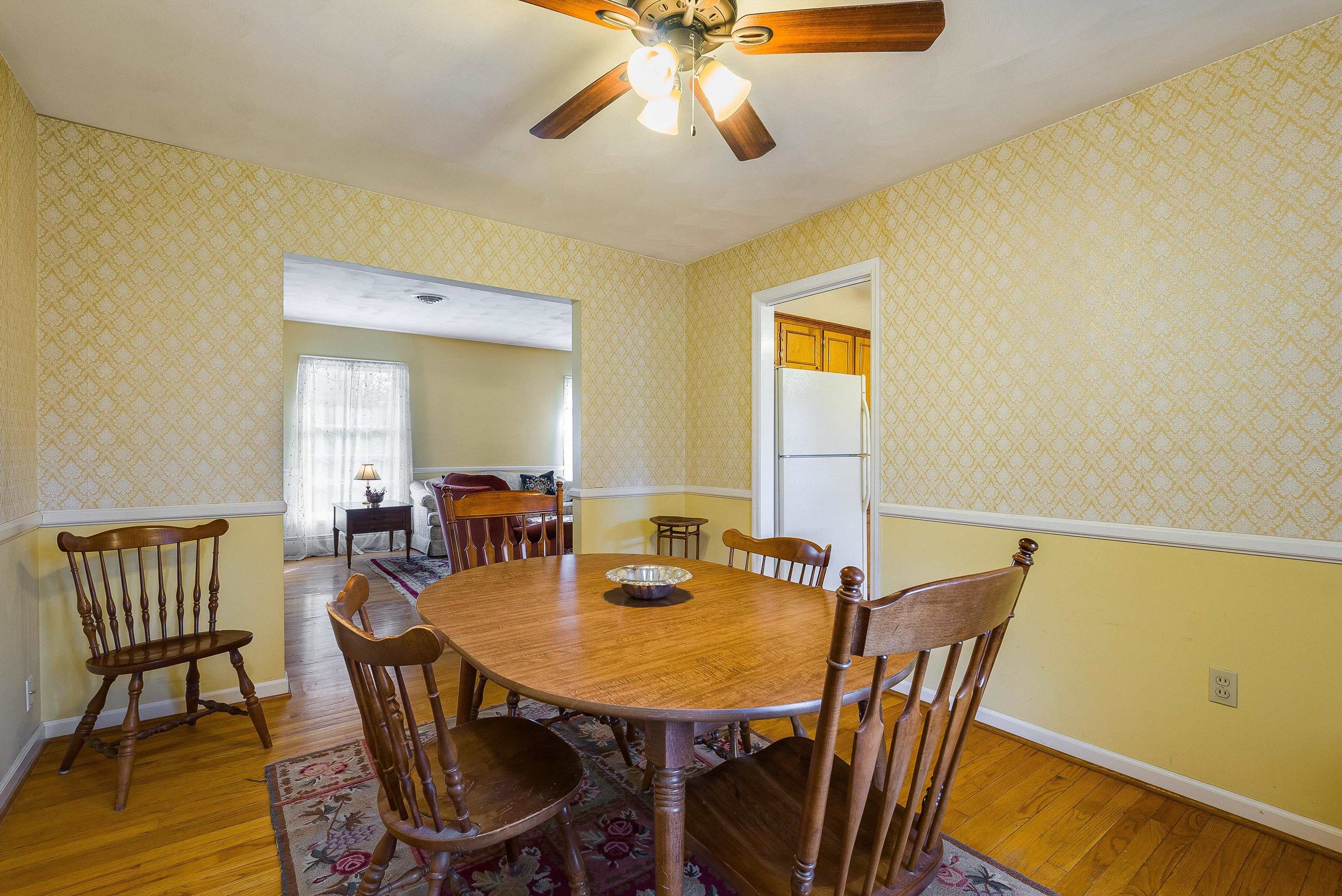 419 Cardinal Street Staunton, VA 24401 - Photo 13 of 47 a view of a dining room with furniture and wooden floor