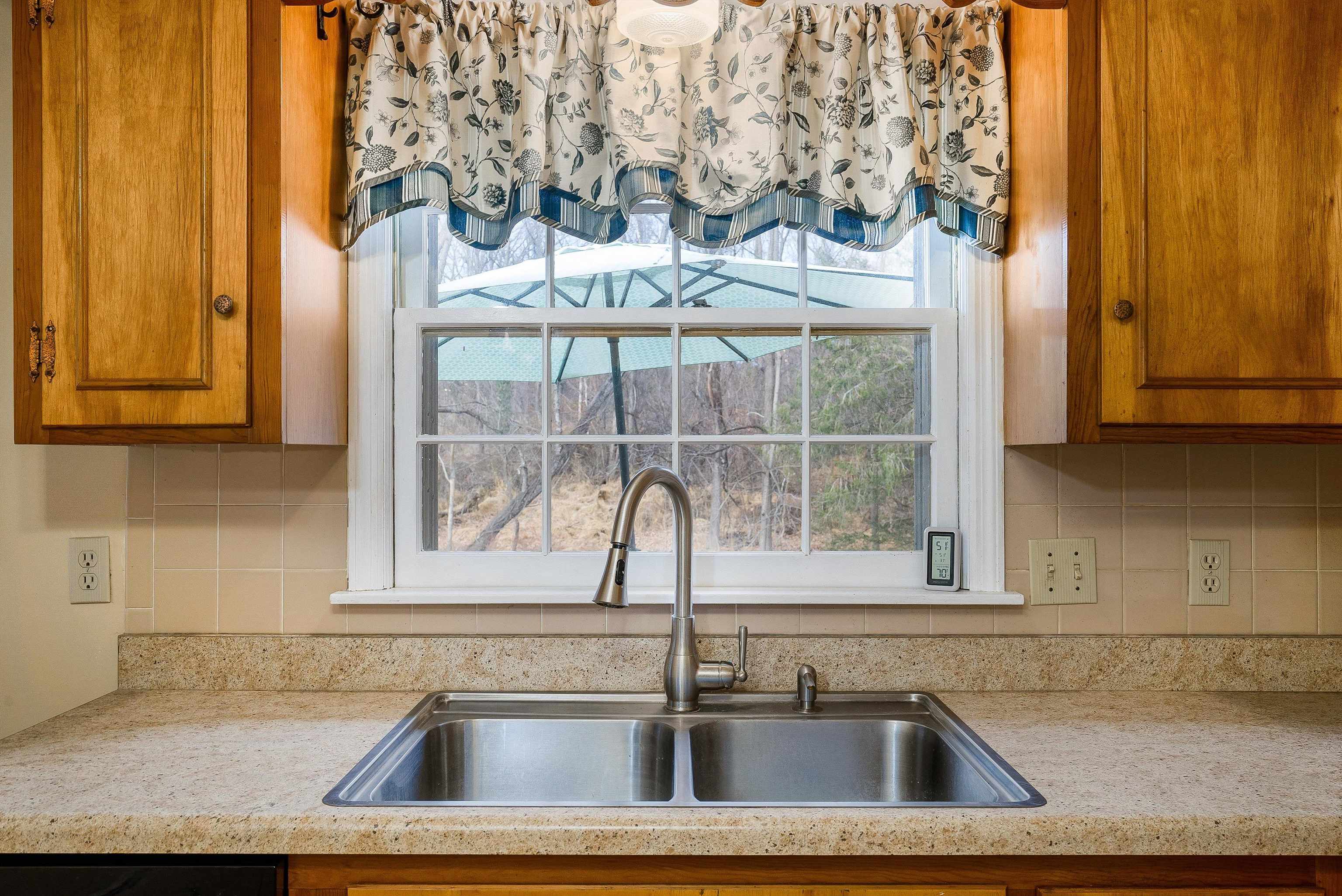 419 Cardinal Street Staunton, VA 24401 - Photo 16 of 47 a kitchen with a sink and a window