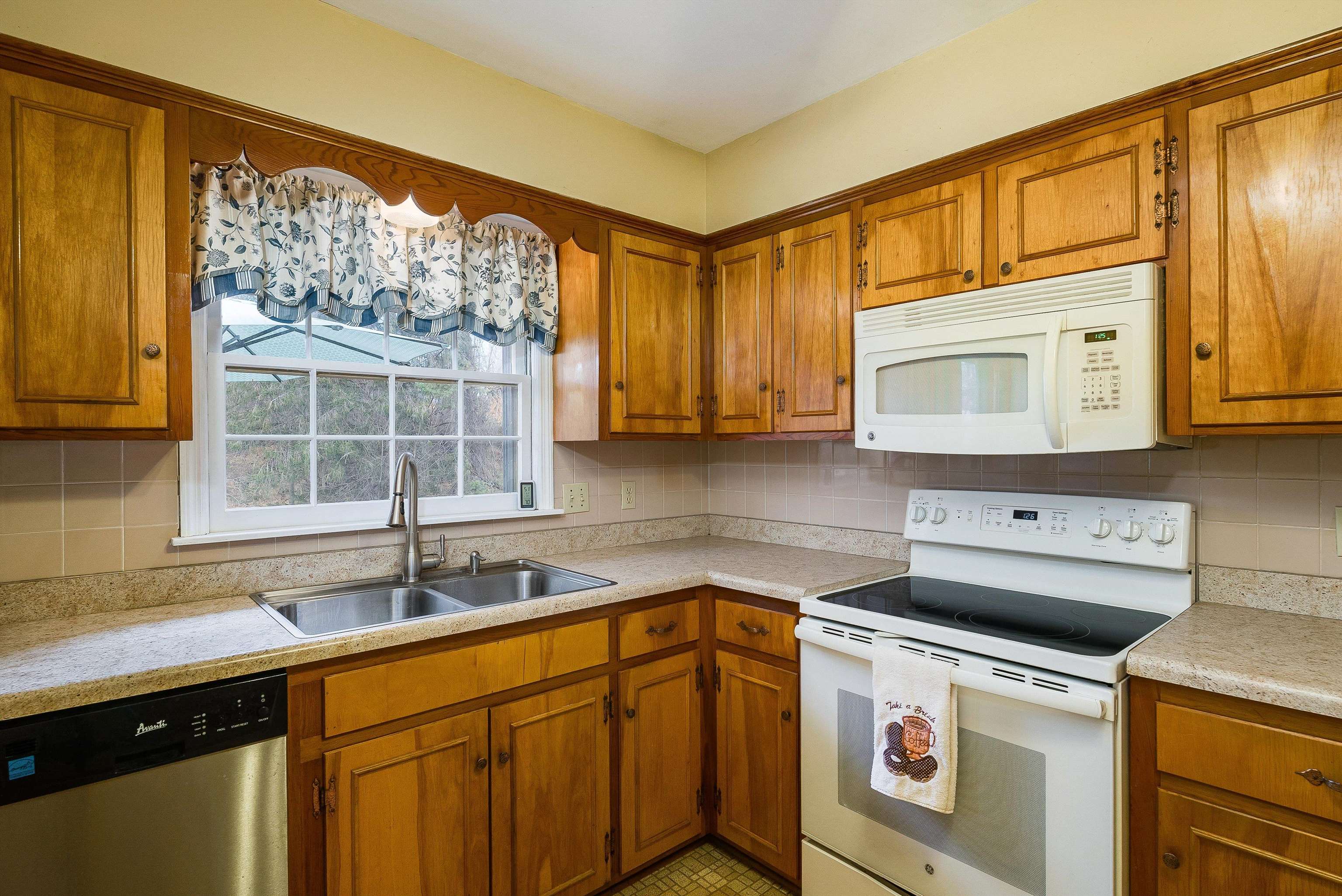 419 Cardinal Street Staunton, VA 24401 - Photo 17 of 47 a kitchen that has a sink and a stove