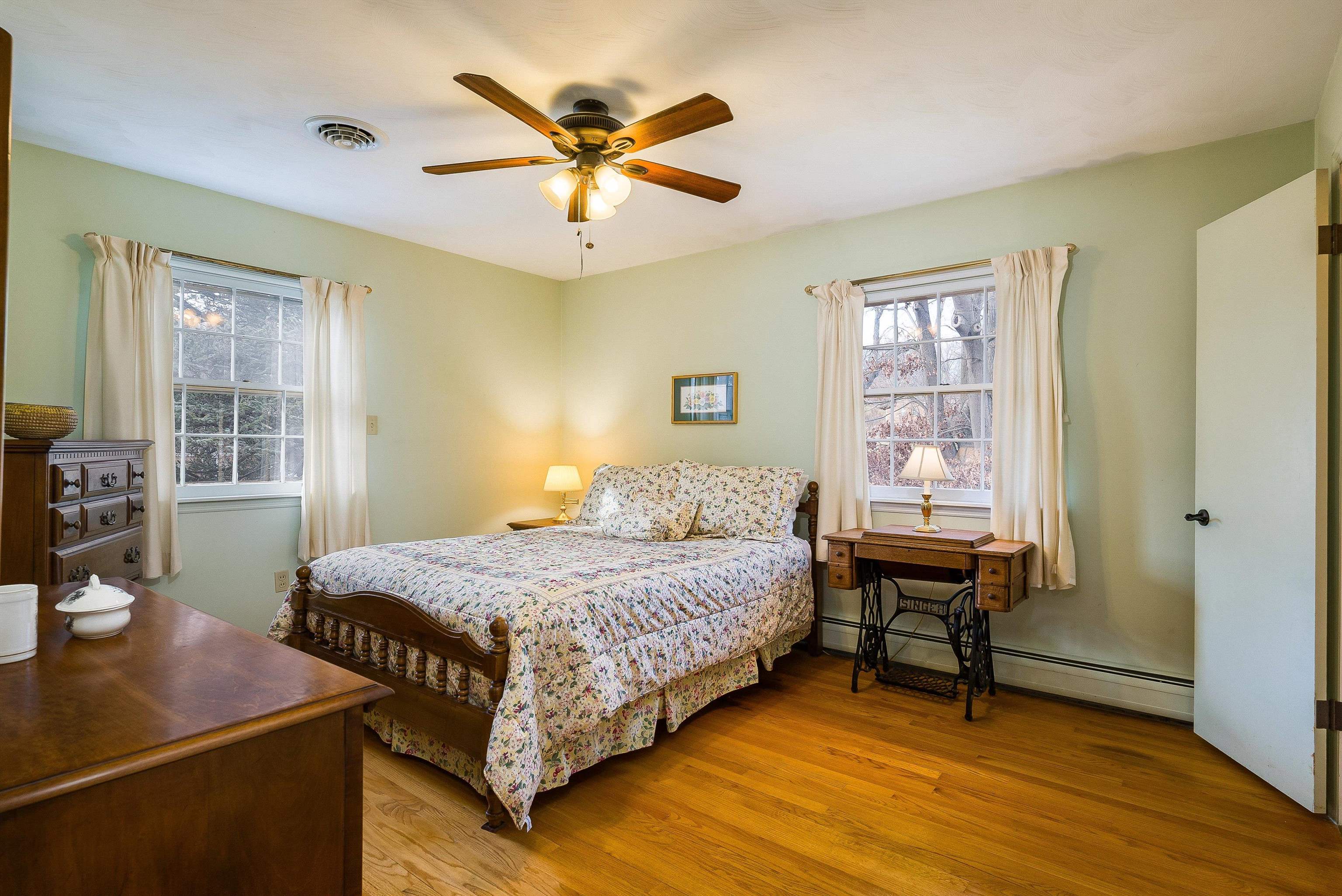 419 Cardinal Street Staunton, VA 24401 - Photo 18 of 47 a bedroom with a bed and a table in it