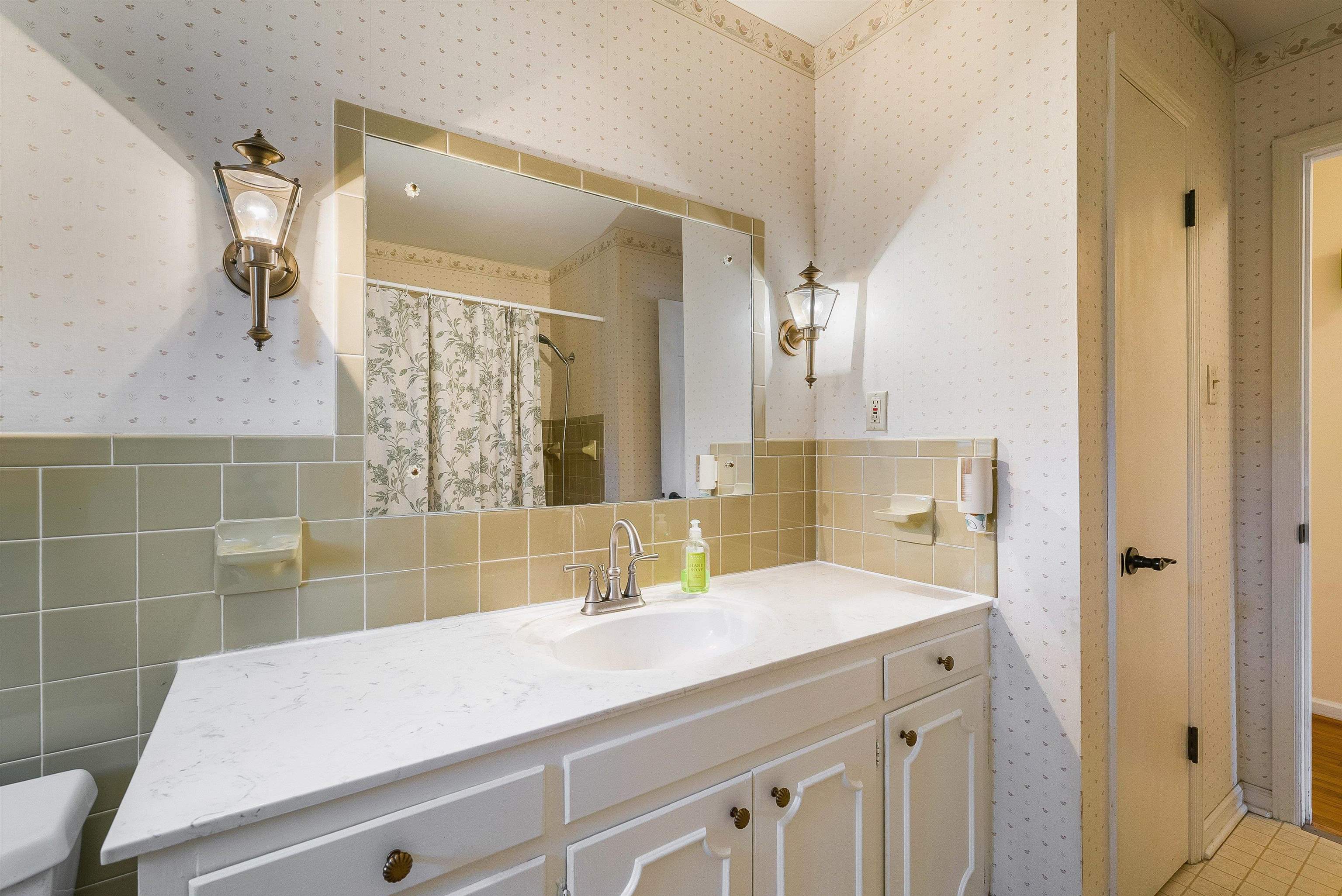 419 Cardinal Street Staunton, VA 24401 - Photo 24 of 47 a bathroom with a sink and a mirror