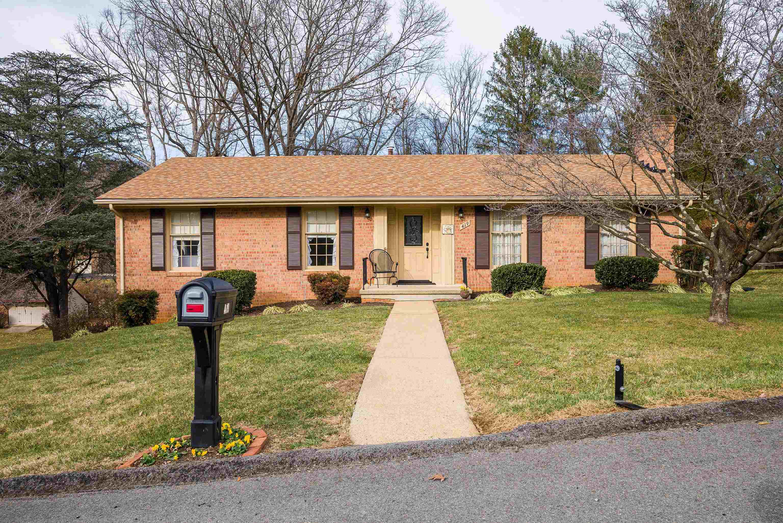 419 Cardinal Street Staunton, VA 24401 - Photo 4 of 47 a front view of a house with garden