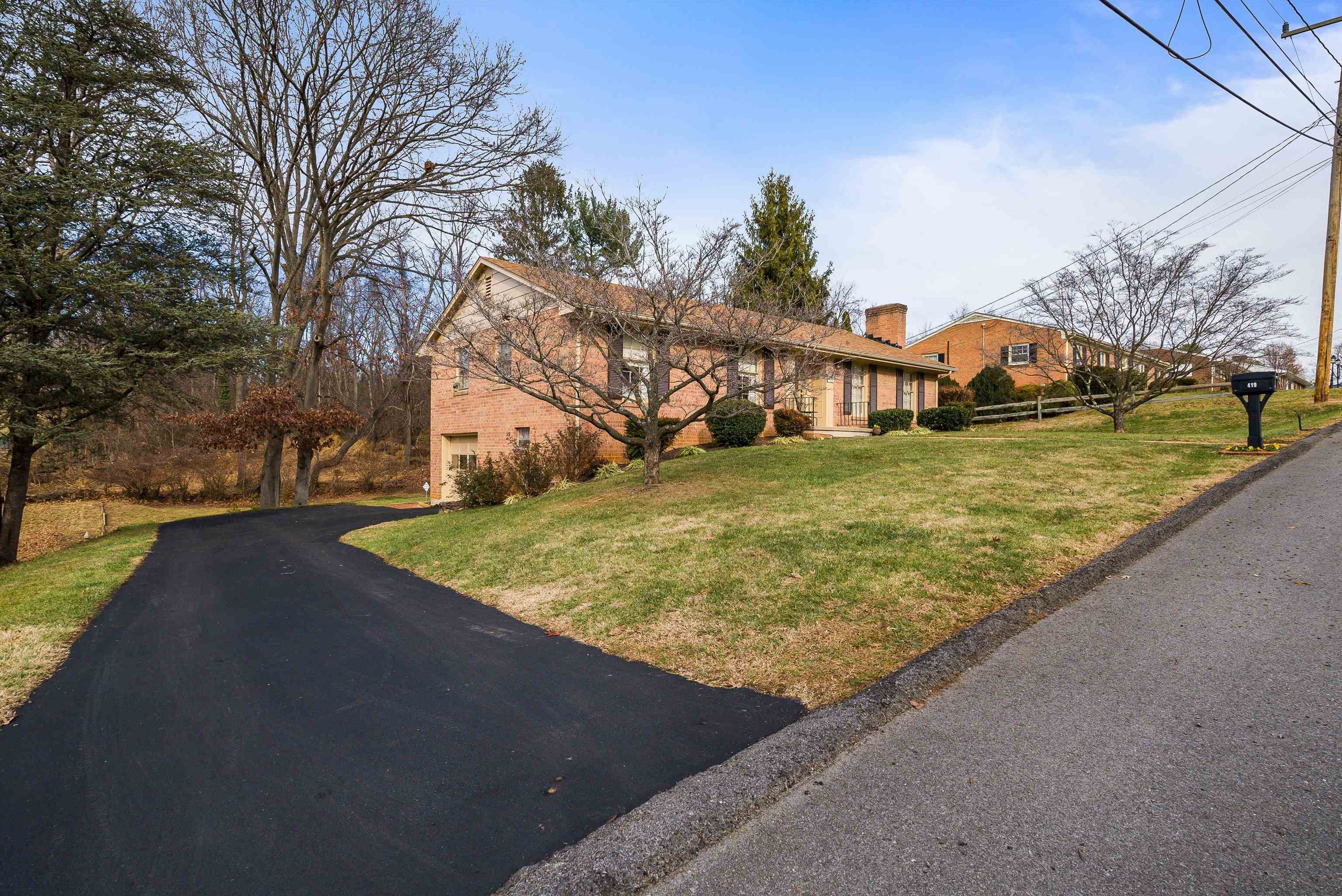 419 Cardinal Street Staunton, VA 24401 - Photo 5 of 47 a view of a big yard with large trees
