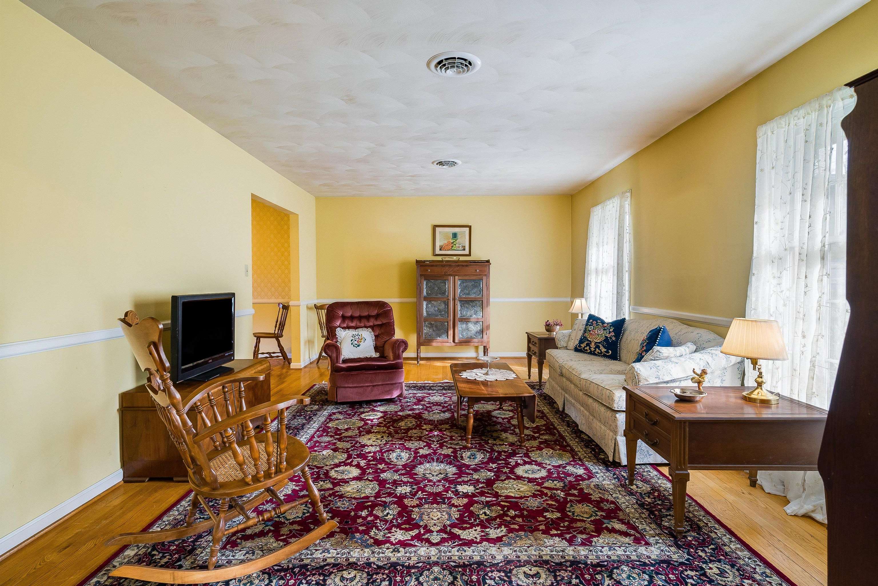 419 Cardinal Street Staunton, VA 24401 - Photo 9 of 47 a living room with furniture and a flat screen tv