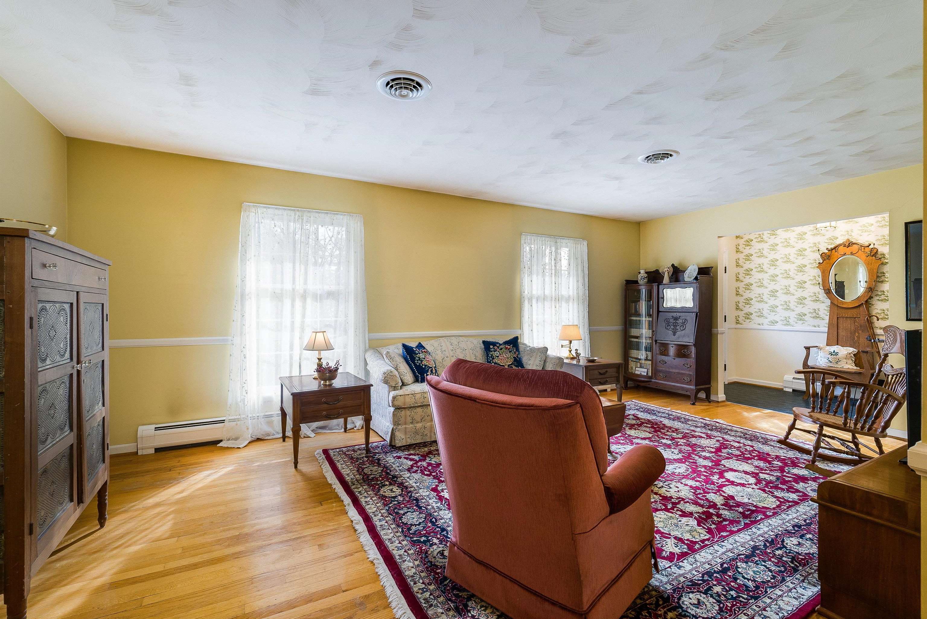 419 Cardinal Street Staunton, VA 24401 - Photo 10 of 47 a living room with furniture a dining table and a large window