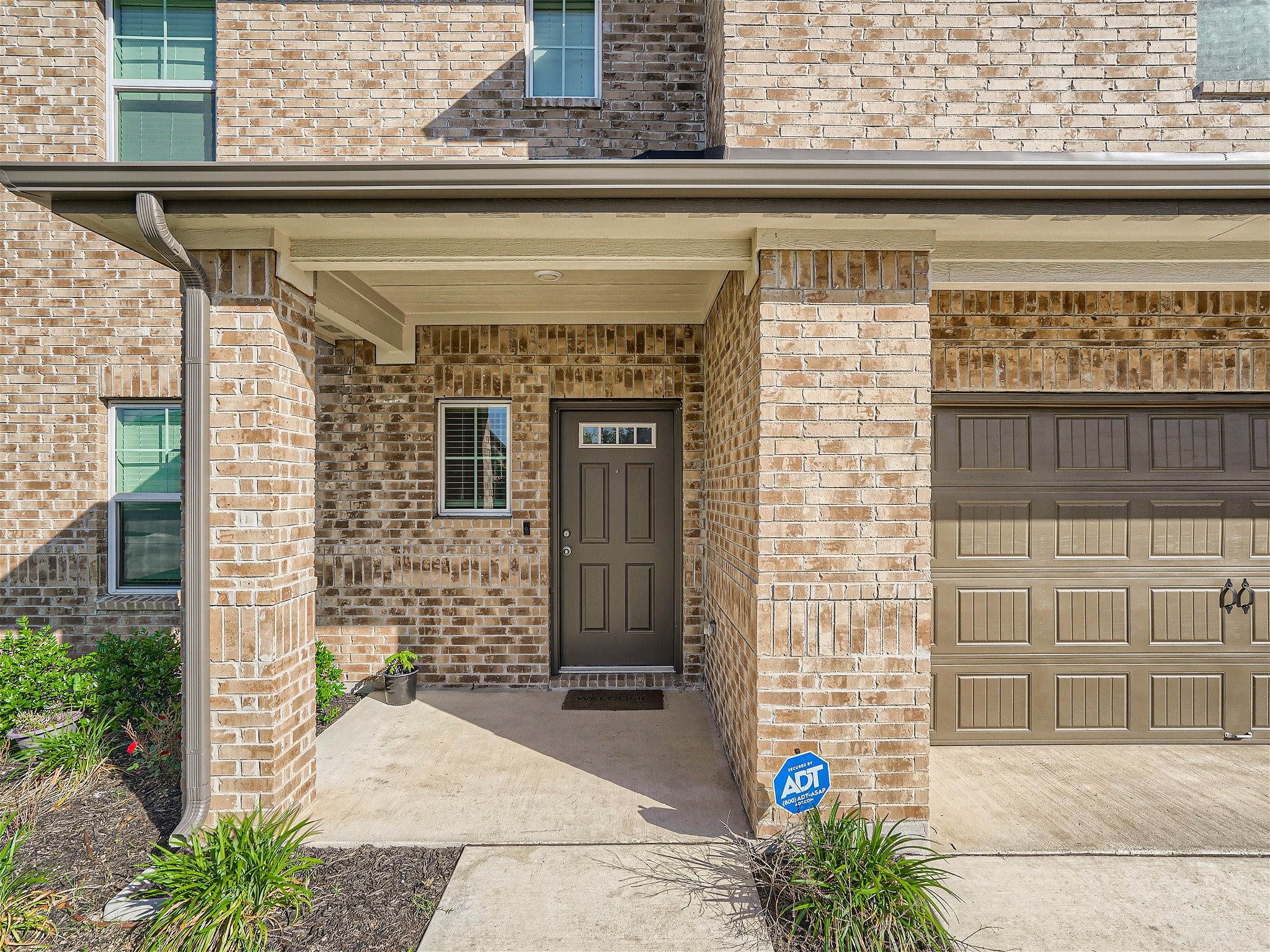 1416 Deering Run Leander, TX 78641 - Photo 3 of 21 a front view of a house with a entrance