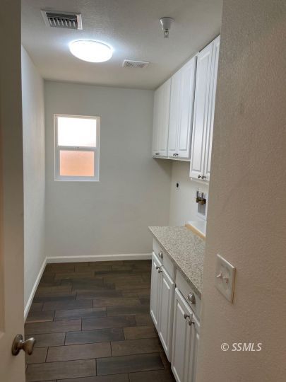 1104 South Yorktown Street Ridgecrest, CA 93555 - Photo 13 of 15 a view of a kitchen with electric appliances