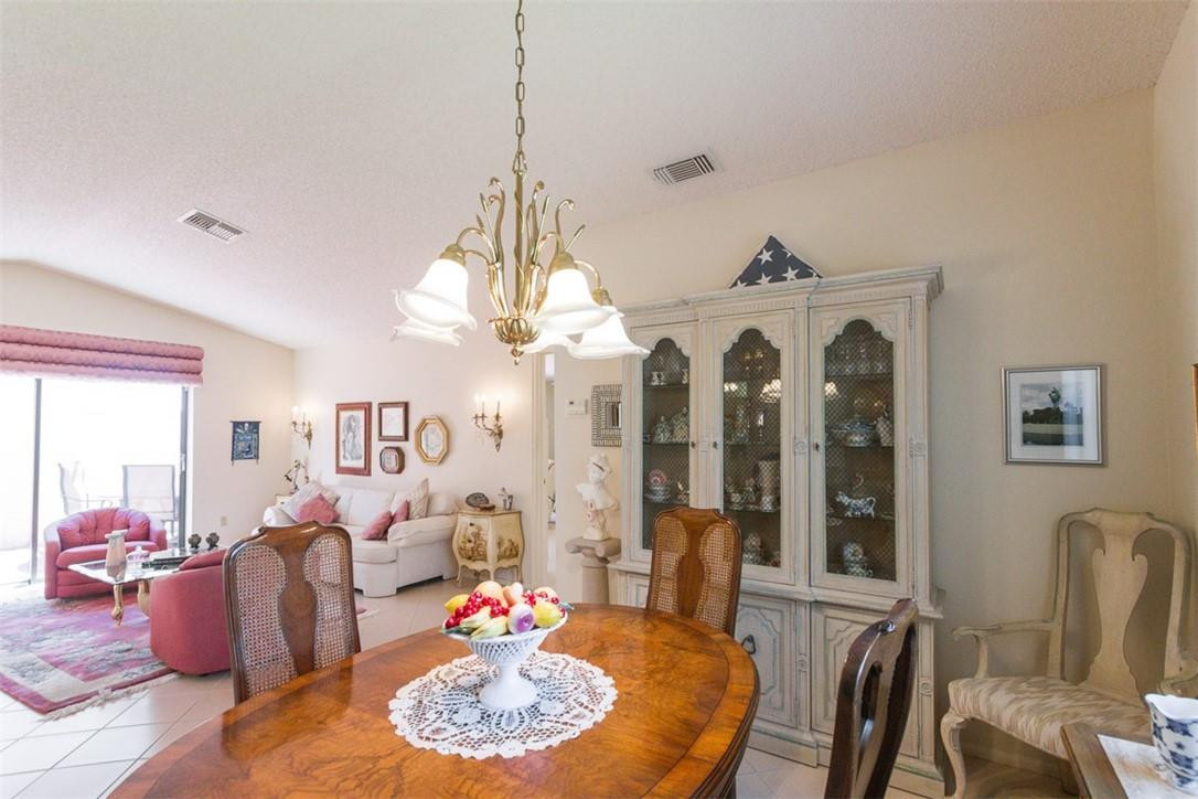 9096 Southwest 20th Street, Unit F Boca Raton, FL 33428 - Photo 5 of 35 a view of a dining room with furniture