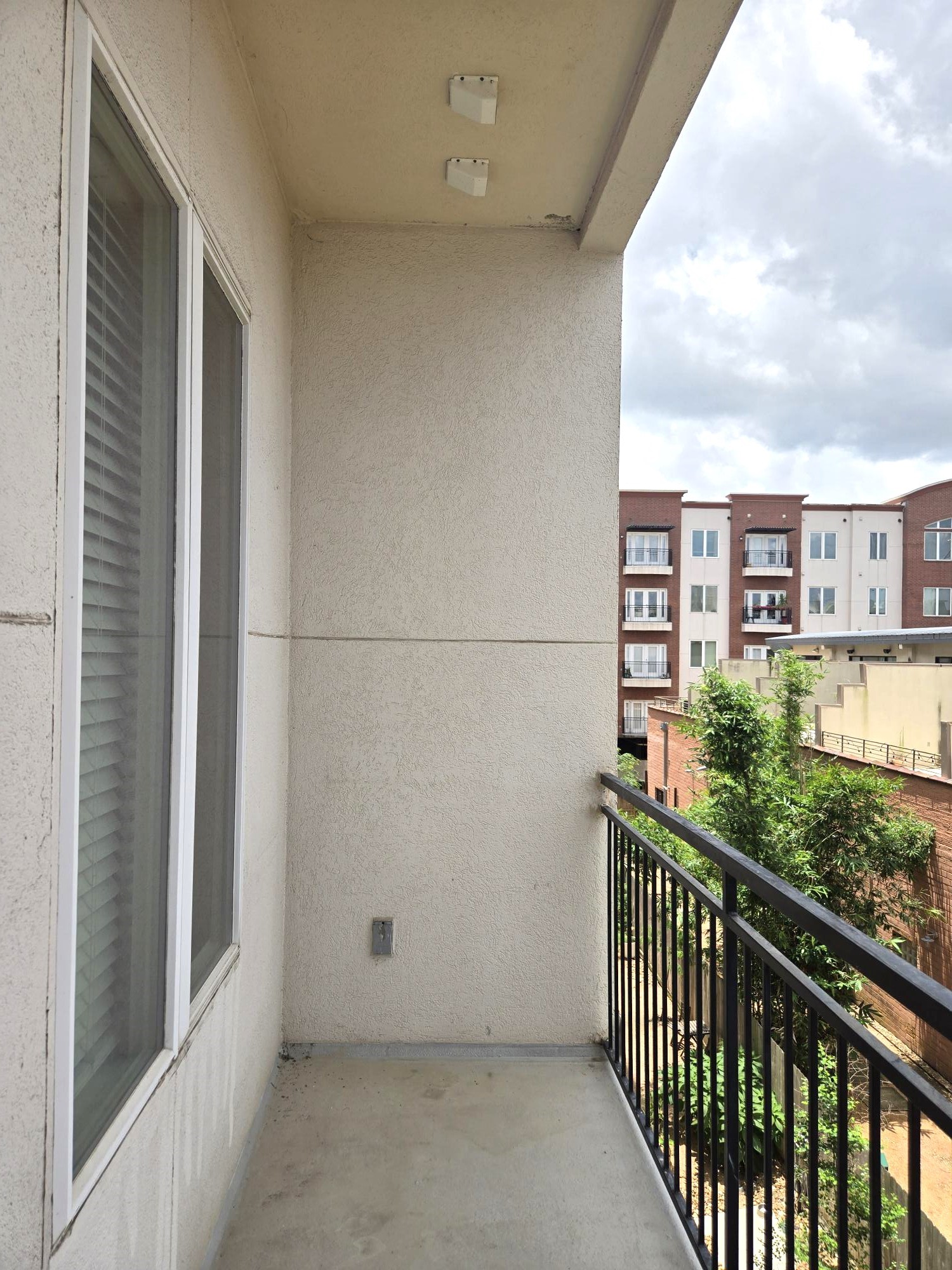1900 Genesee Street, Unit 207 Houston, TX 77006 - Photo 37 of 50 Private covered balcony with nice views