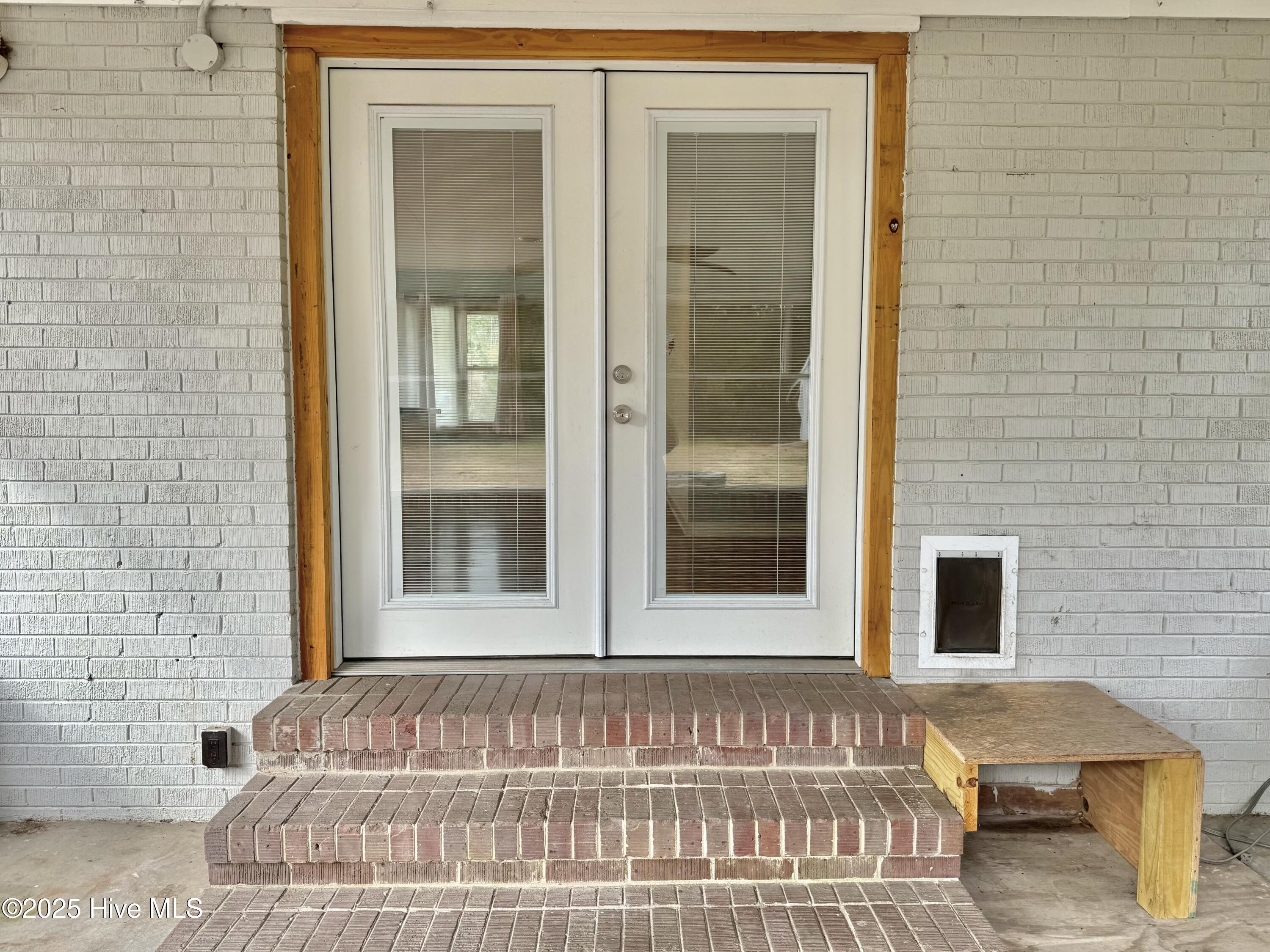 3929 Masonboro Loop Road Wilmington, NC 28409 - Photo 46 of 56 Back door exterior