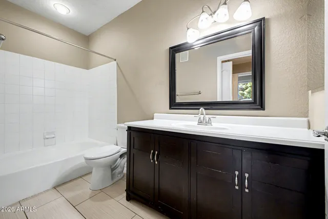 a bathroom with a toilet a sink and a bathtub