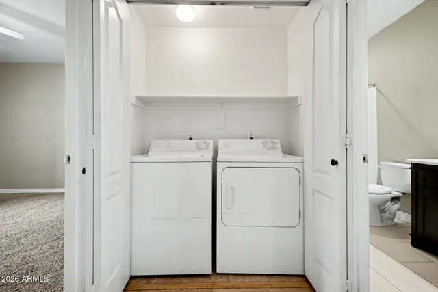 a utility room with dryer and washer