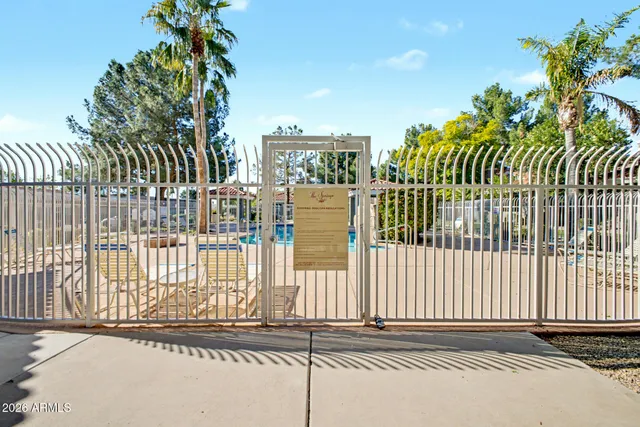 a view of a balcony with a pot