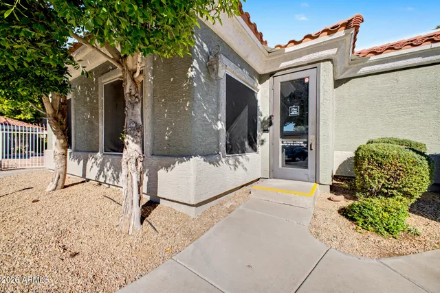 a view of a chairs and tables in the patio