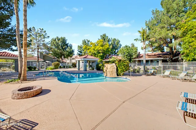 a view of a house with outdoor space and sitting area