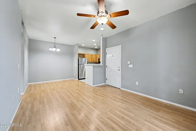 a view of a kitchen with a dishwasher cabinet and a microwave