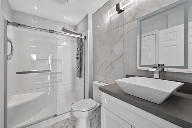 a bedroom with a bed and a table