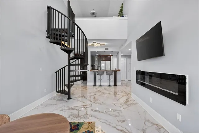 a view of livingroom with furniture and fireplace