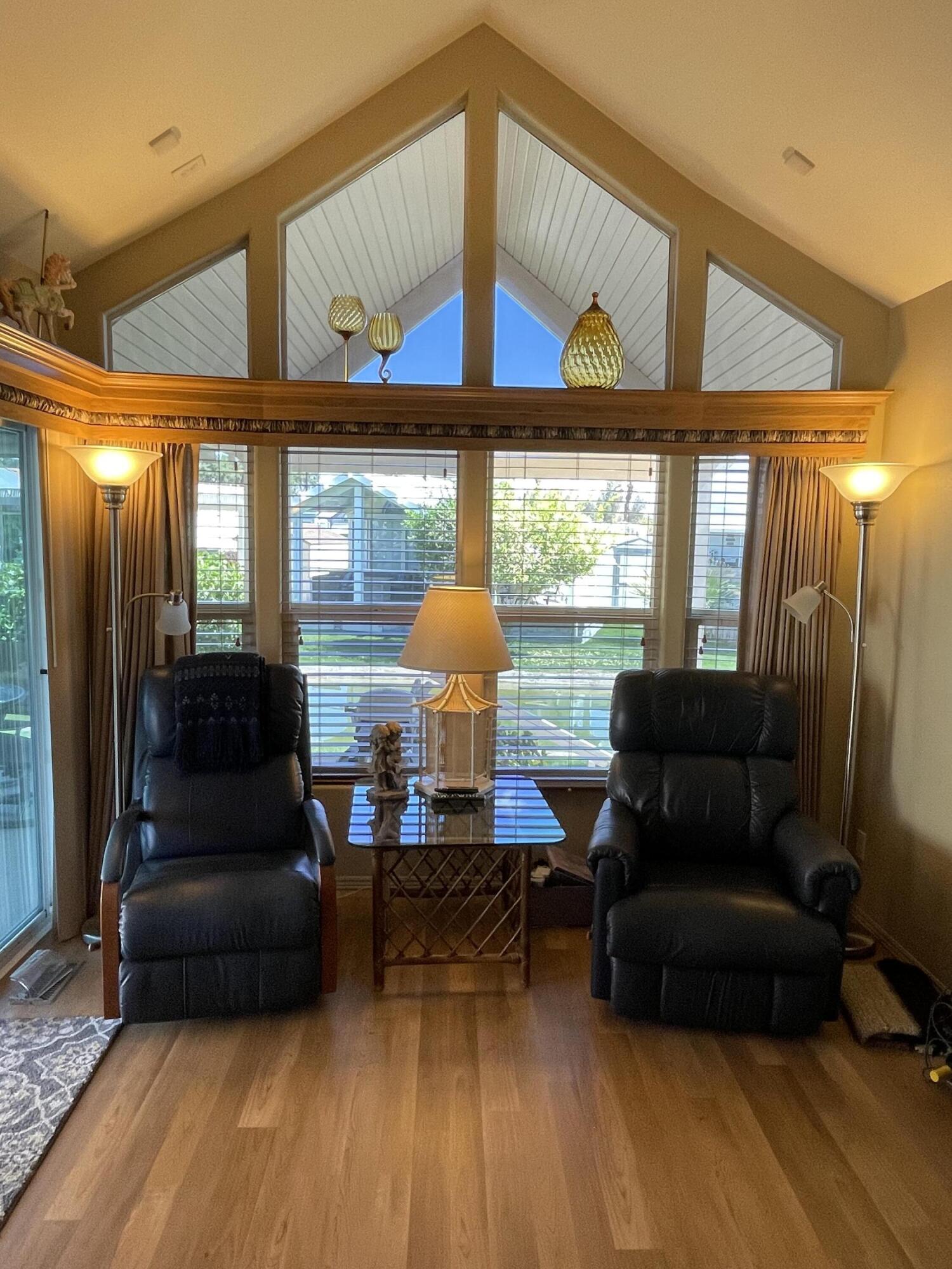 81620 Ave 49, Unit 235B Indio, CA 92201 - Photo 2 of 21 a living room with furniture and a large window