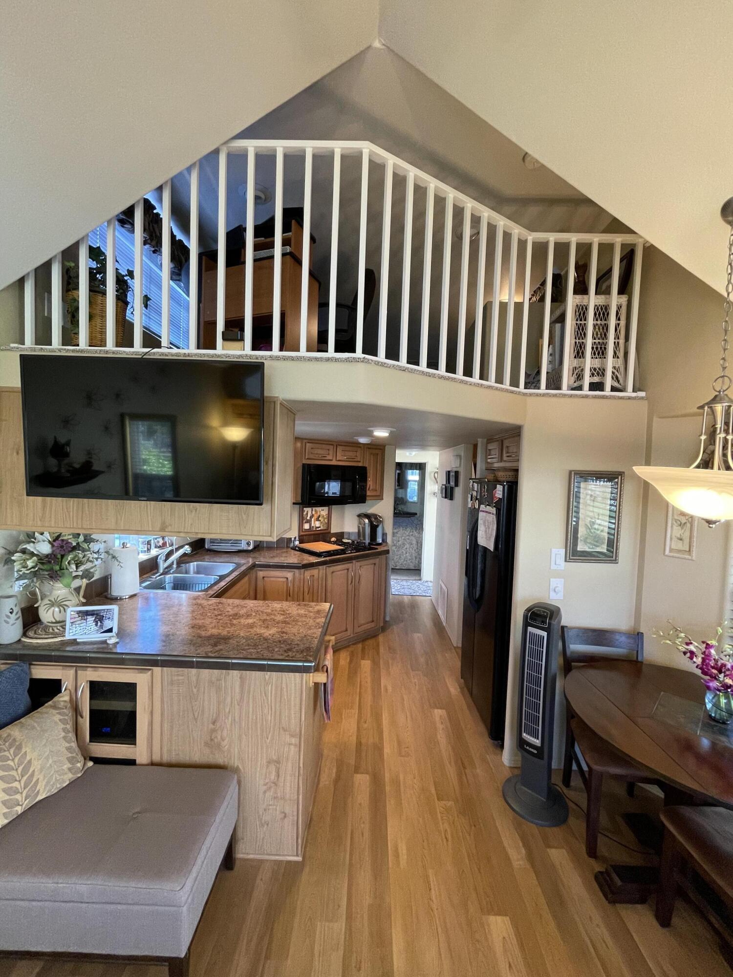 81620 Ave 49, Unit 235B Indio, CA 92201 - Photo 7 of 21 a view of a living room and dining room