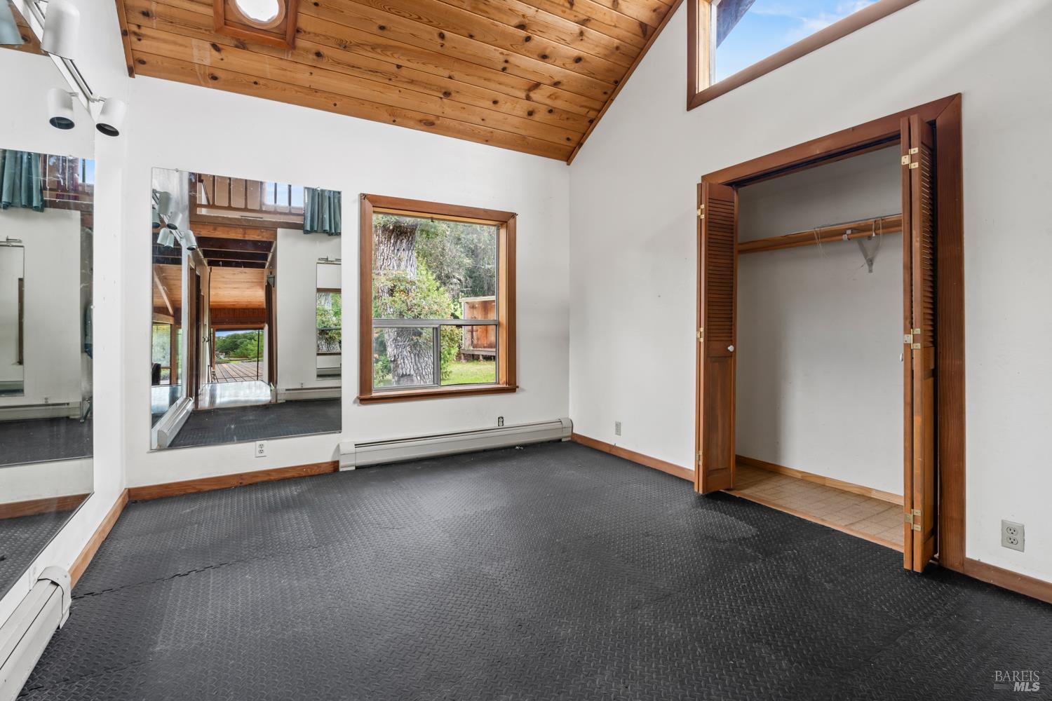 13800 Poonkinney Road Dos Rios, CA 95429 - Photo 14 of 28 a view of an empty room with a window