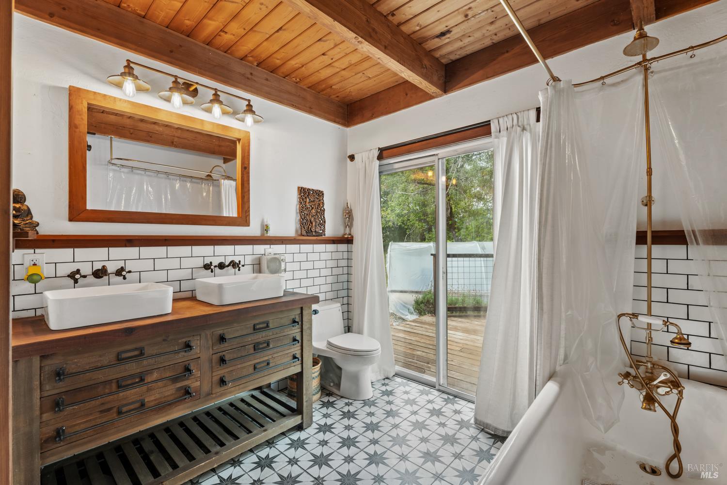 13800 Poonkinney Road Dos Rios, CA 95429 - Photo 16 of 28 a bathroom with a sink and a mirror