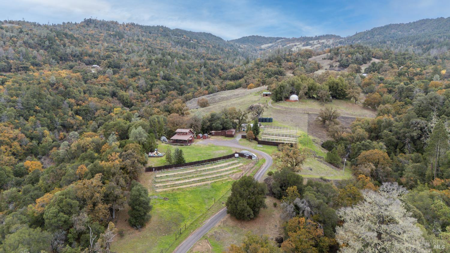 13800 Poonkinney Road Dos Rios, CA 95429 - Photo 8 of 28 an aerial view of residential house with green space