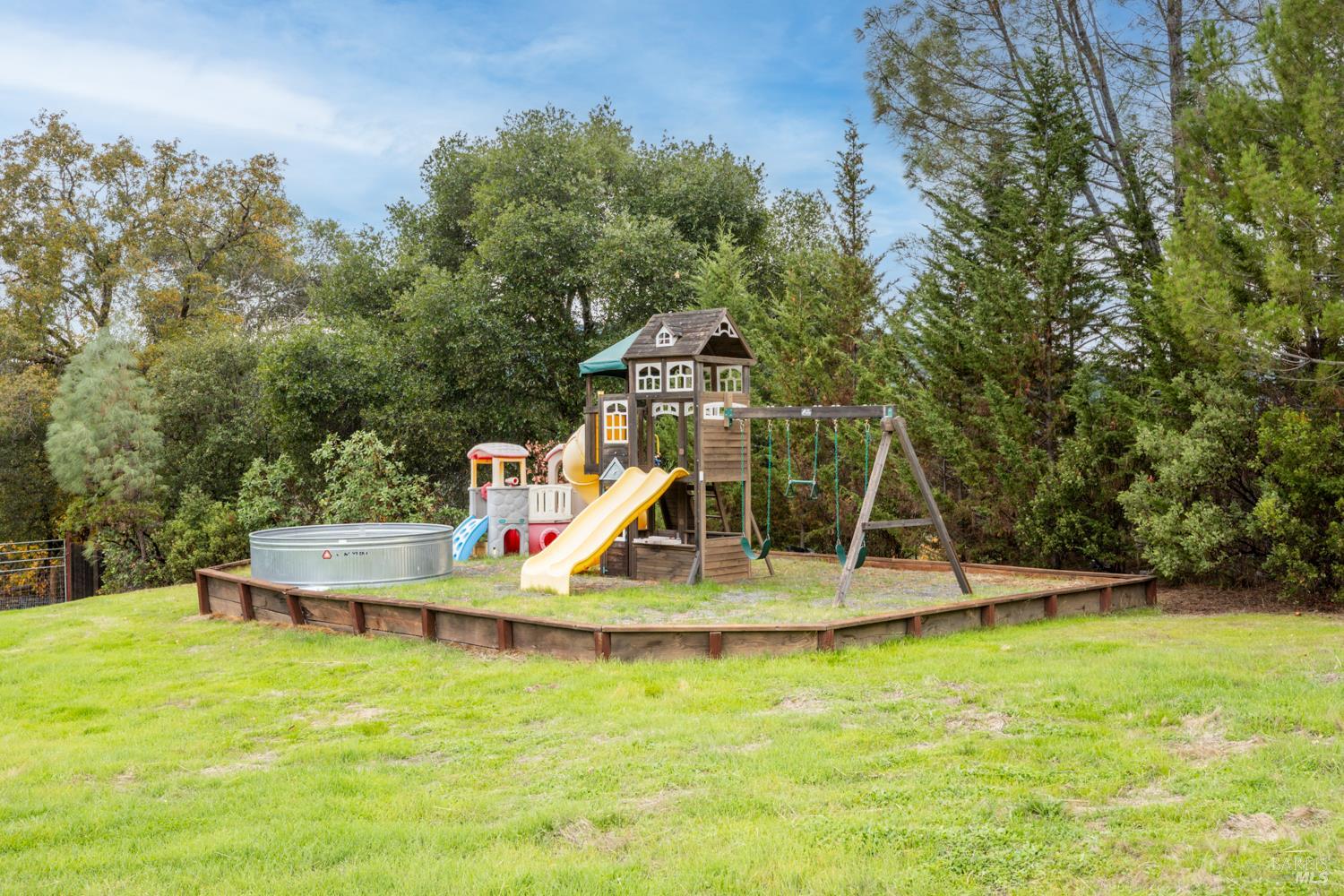 13800 Poonkinney Road Dos Rios, CA 95429 - Photo 10 of 28 a view of a swimming pool with a yard