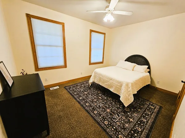 a living room with a rug