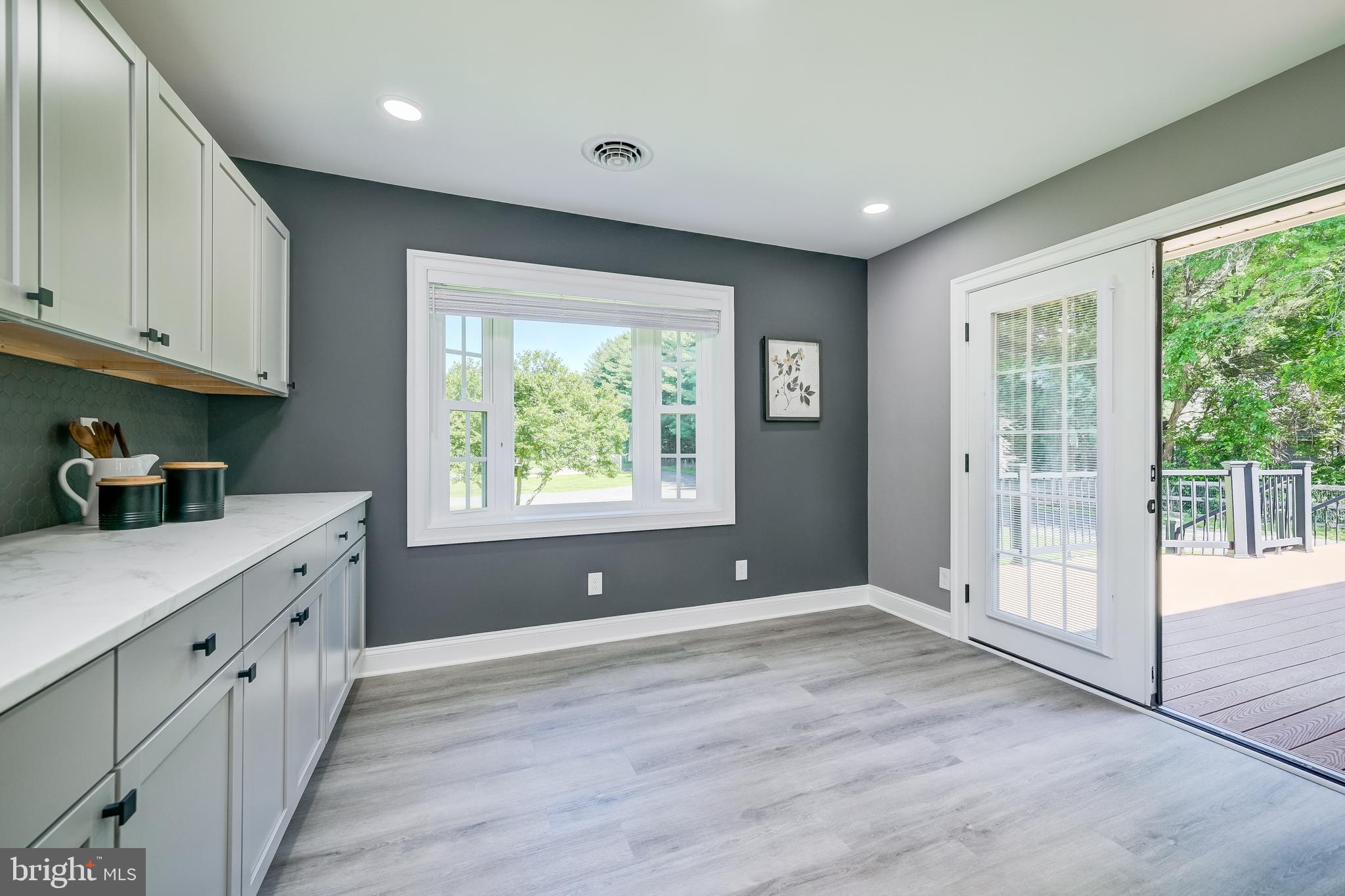 21020 Peach Tree Road Dickerson, MD 20842 - Photo 15 of 57 a view of kitchen with wooden floor and fan