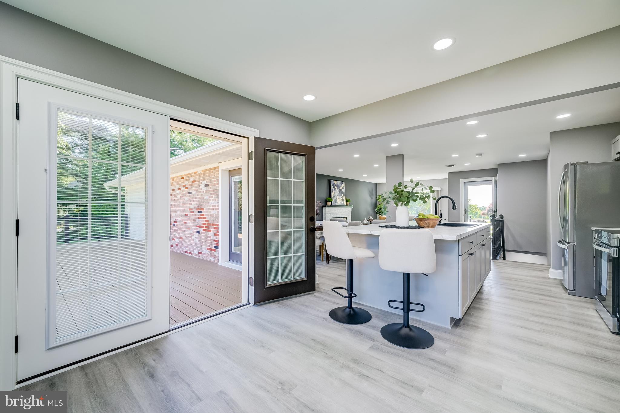 21020 Peach Tree Road Dickerson, MD 20842 - Photo 17 of 57 a view of kitchen with furniture and a chandelier