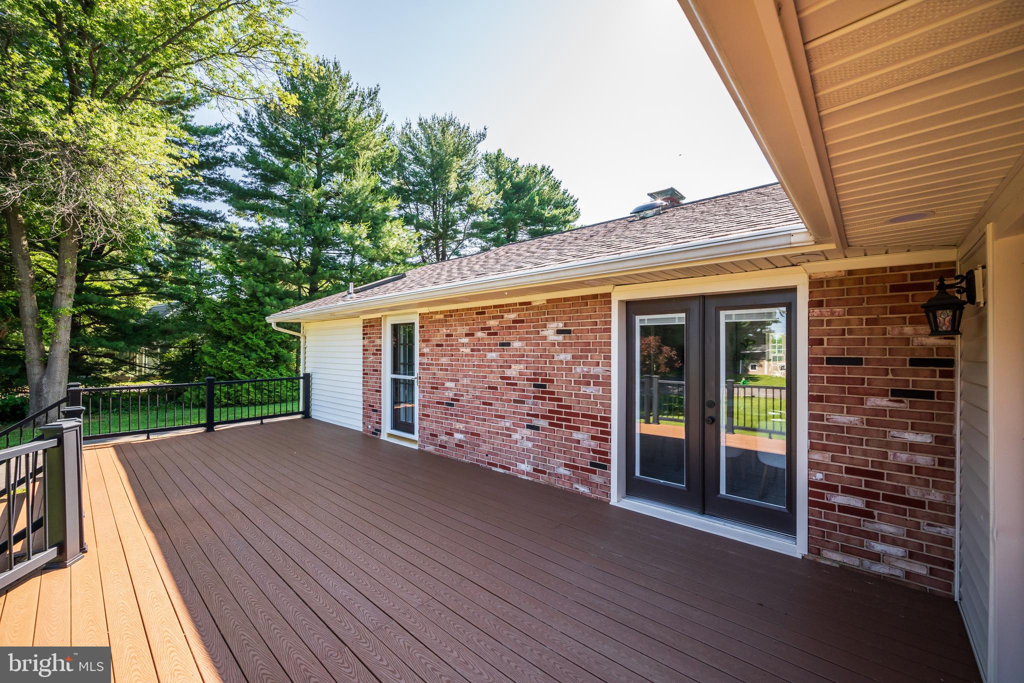 21020 Peach Tree Road Dickerson, MD 20842 - Photo 18 of 57 a view of a house with a wooden deck