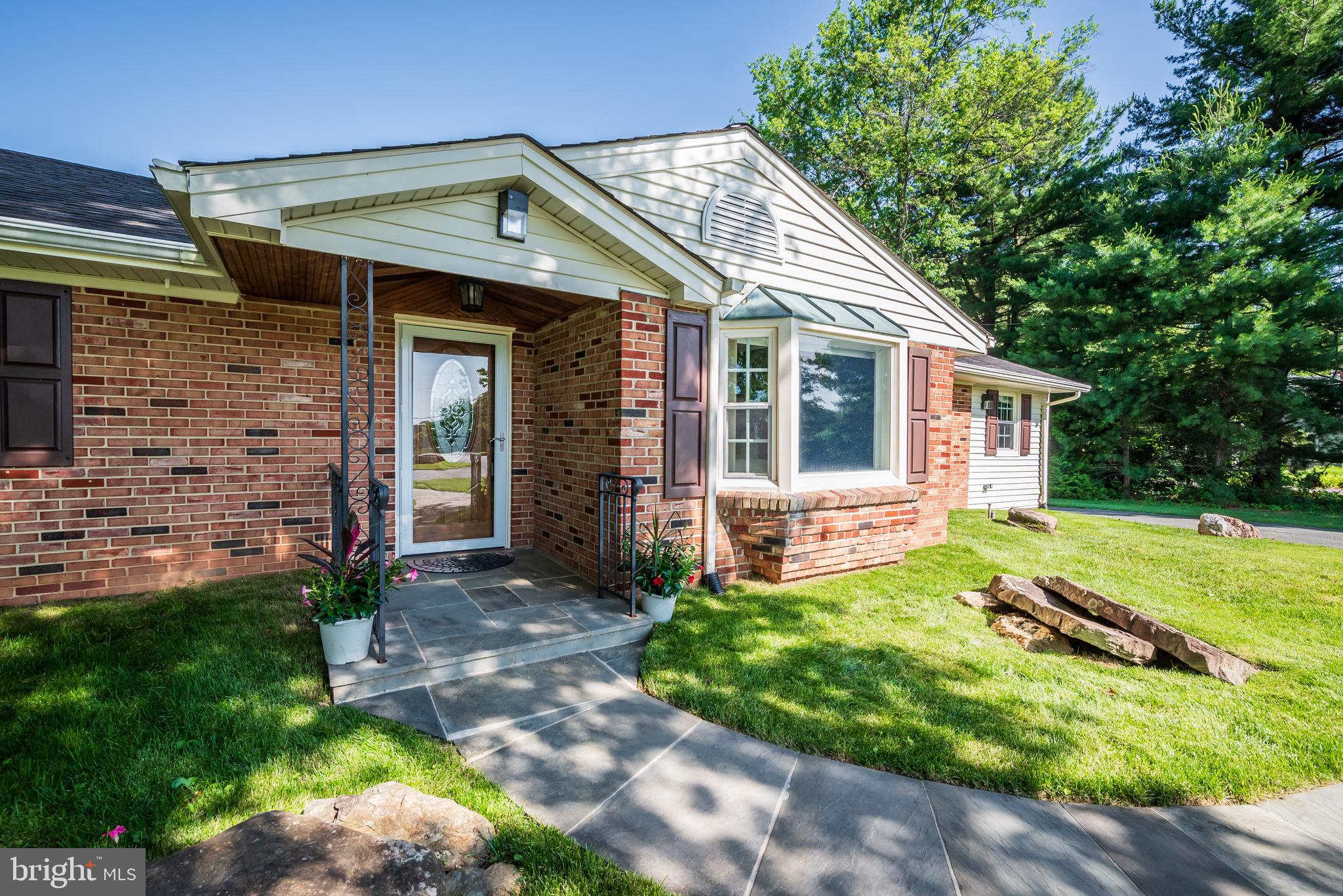 21020 Peach Tree Road Dickerson, MD 20842 - Photo 2 of 57 a front view of a house with a yard
