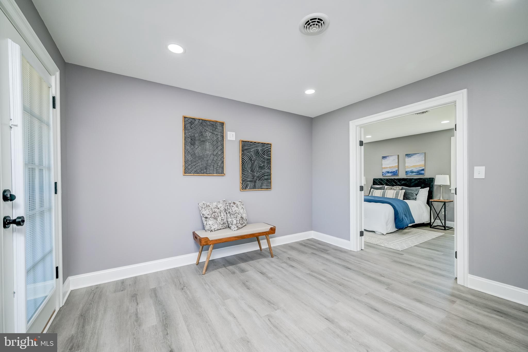 21020 Peach Tree Road Dickerson, MD 20842 - Photo 25 of 57 a view of empty room with wooden floor and windows