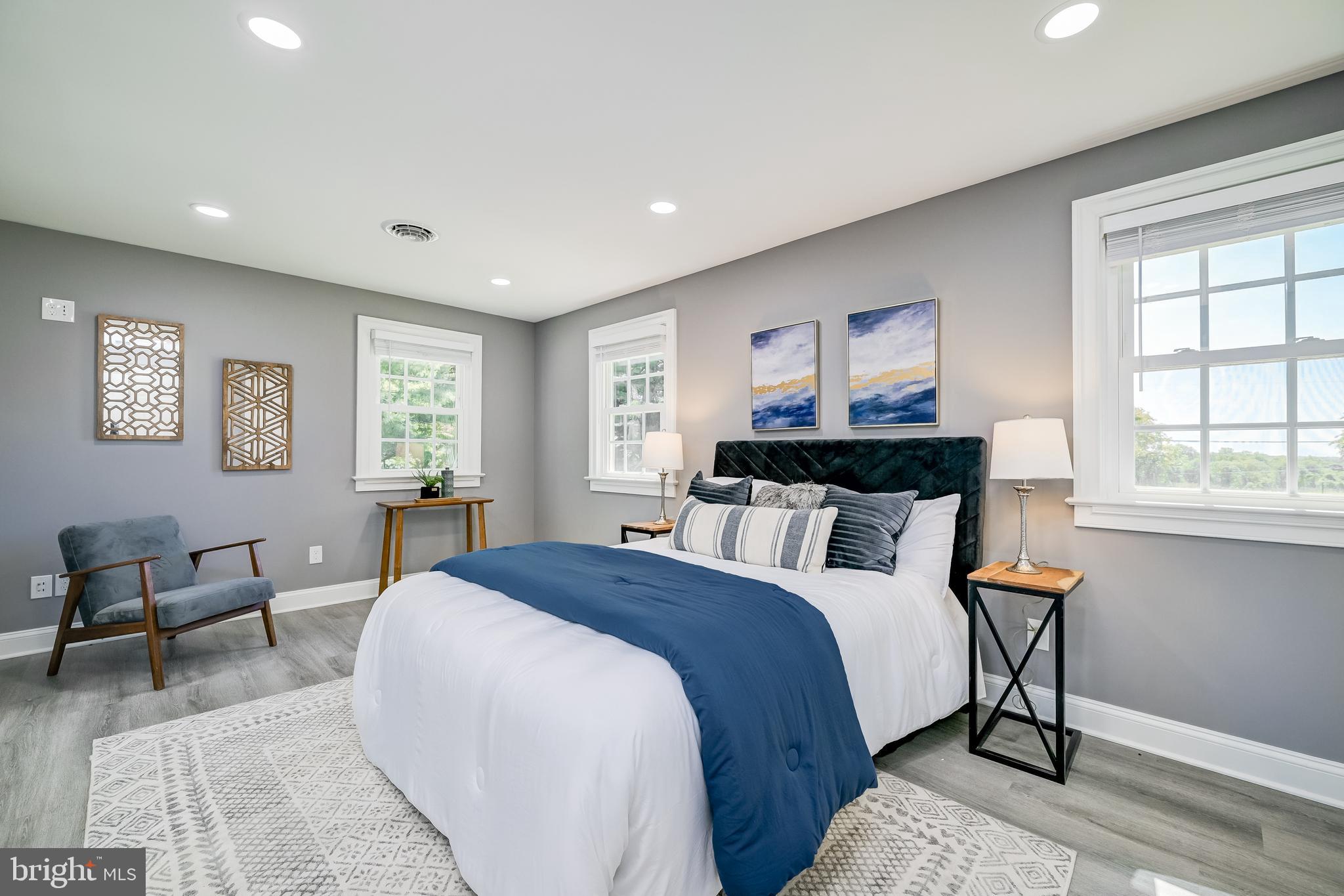 21020 Peach Tree Road Dickerson, MD 20842 - Photo 26 of 57 a bed room with a bed and a chair