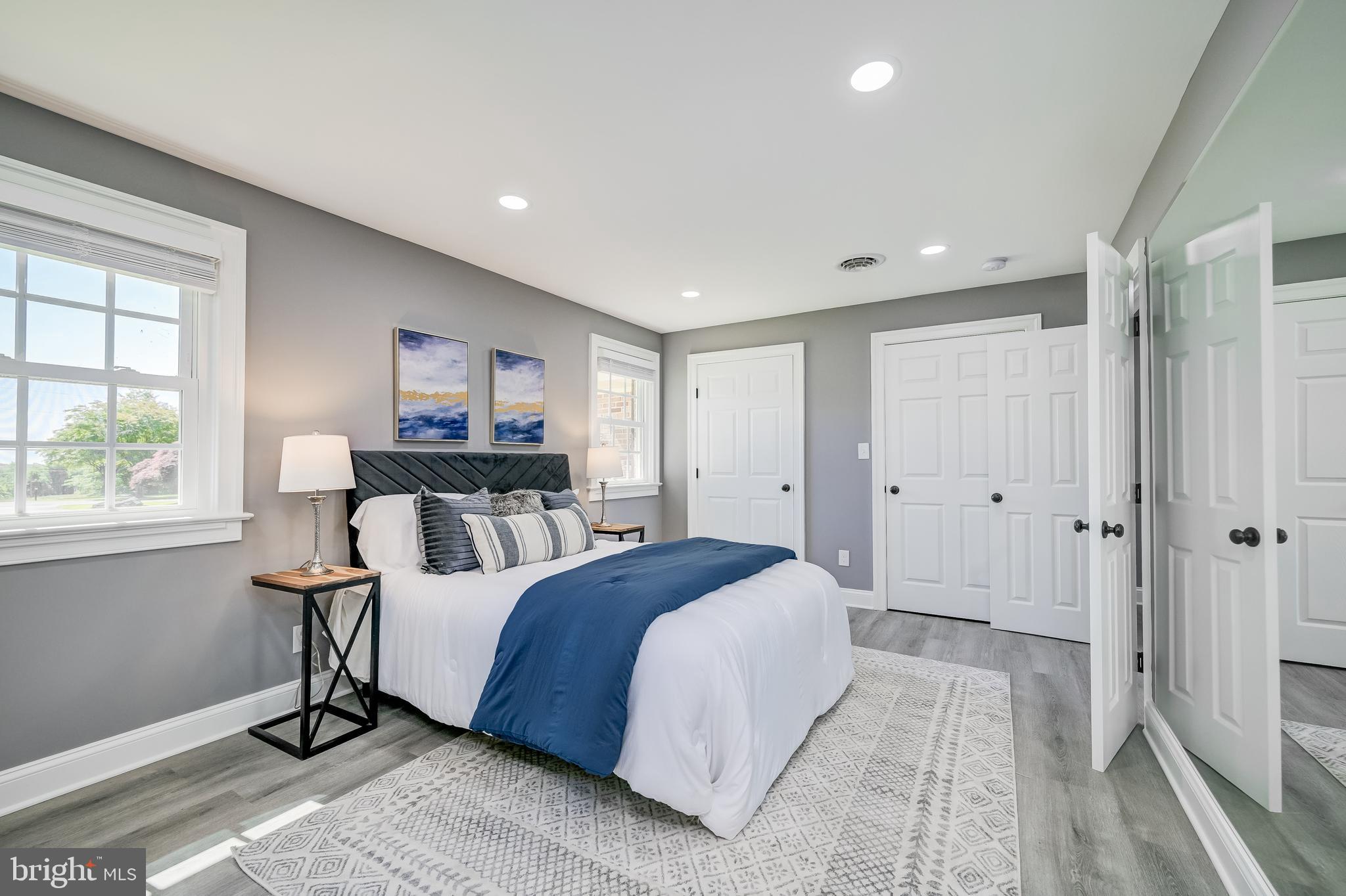 21020 Peach Tree Road Dickerson, MD 20842 - Photo 27 of 57 a spacious bedroom with a bed and a window