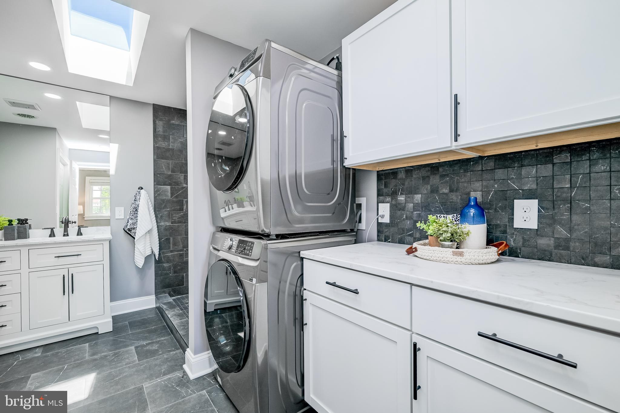21020 Peach Tree Road Dickerson, MD 20842 - Photo 29 of 57 a utility room with sink dryer and washer
