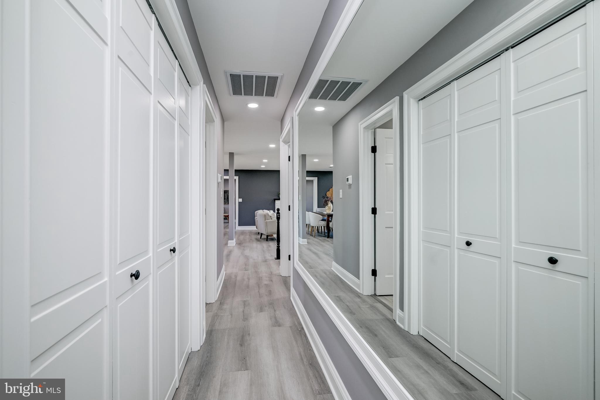21020 Peach Tree Road Dickerson, MD 20842 - Photo 31 of 57 a view of a hallway with wooden floor and staircase