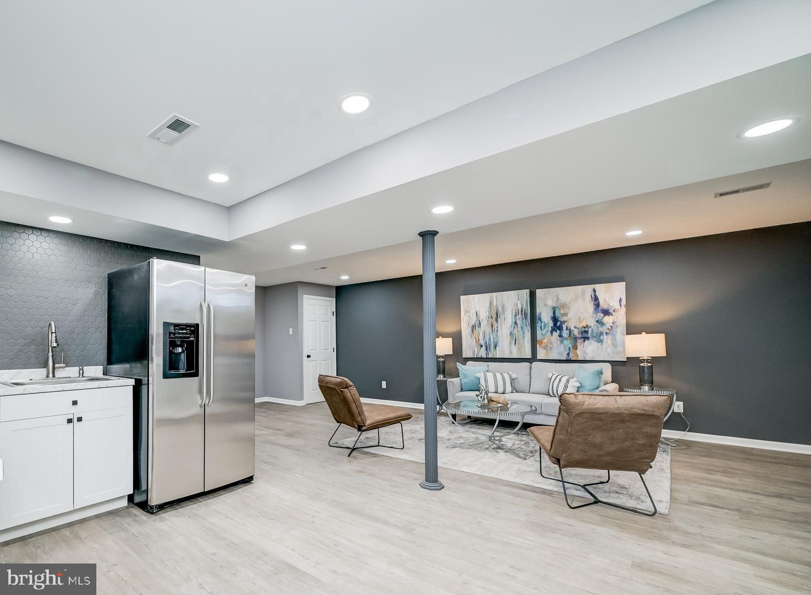 21020 Peach Tree Road Dickerson, MD 20842 - Photo 43 of 57 a living room with furniture and a wooden floor