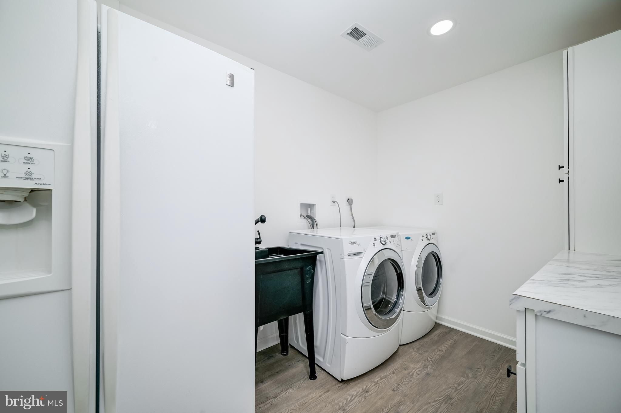 21020 Peach Tree Road Dickerson, MD 20842 - Photo 45 of 57 a utility room with dryer and washer