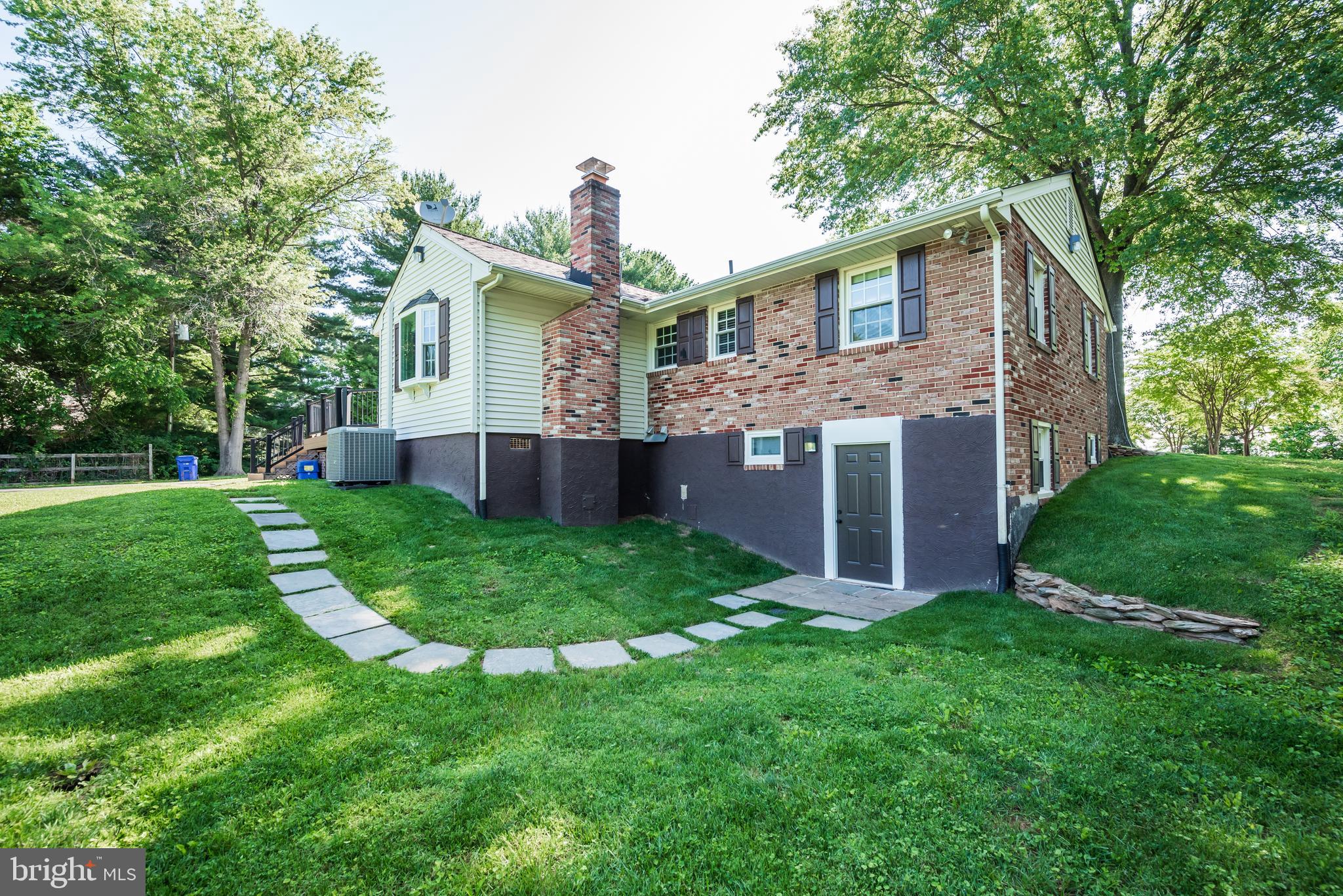 21020 Peach Tree Road Dickerson, MD 20842 - Photo 48 of 57 a front view of house with yard and green space