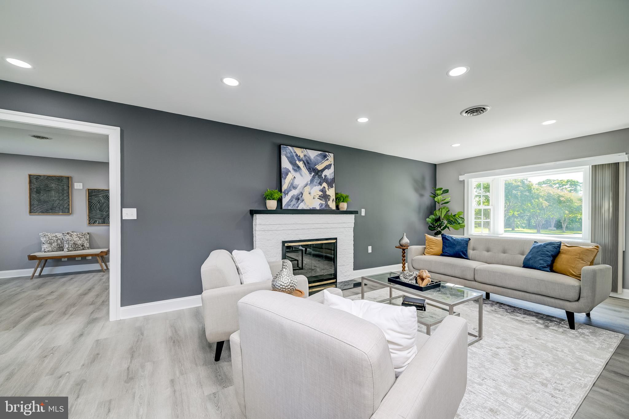 21020 Peach Tree Road Dickerson, MD 20842 - Photo 5 of 57 a living room with furniture and a fireplace